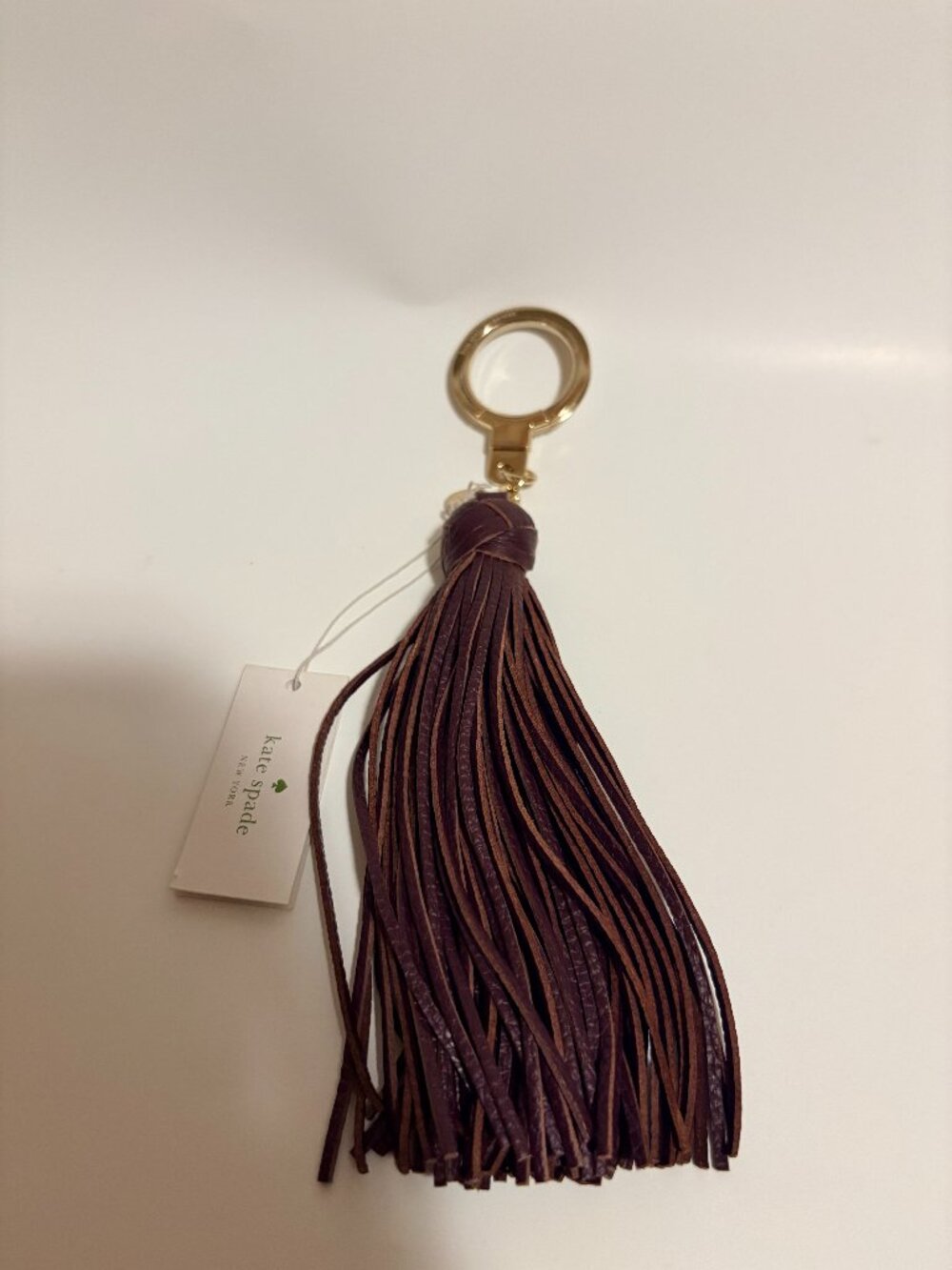 Kate Spade New York NWT Deep Plum Leather Tassel Keychain Bag Charm